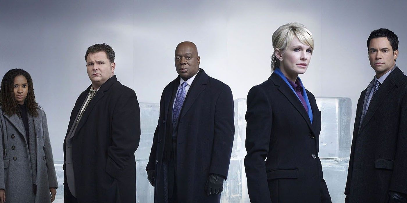 A promo photo from Cold Case featuring the cast in coats in front of ice blocks
