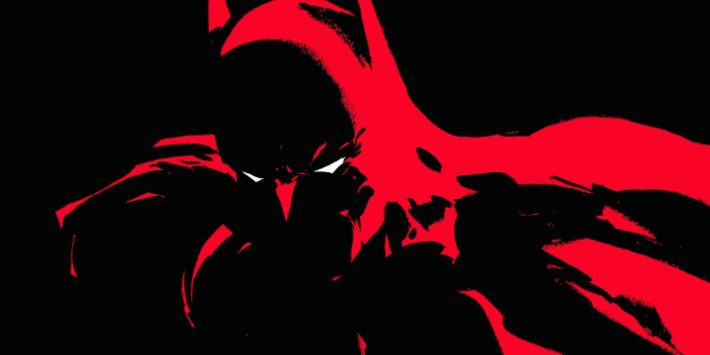 Batman's neon red silhouette on the cover of Dark Victory.