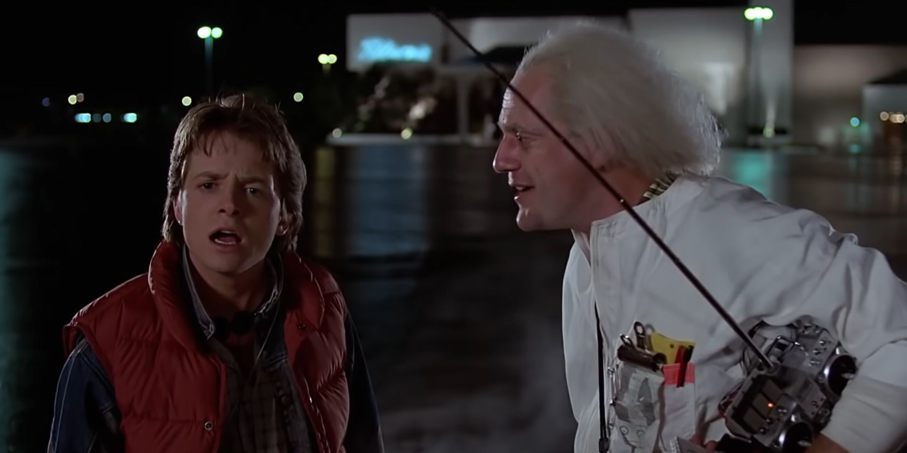 Doc Brown raving about time travel and Marty confused in Back To The Future
