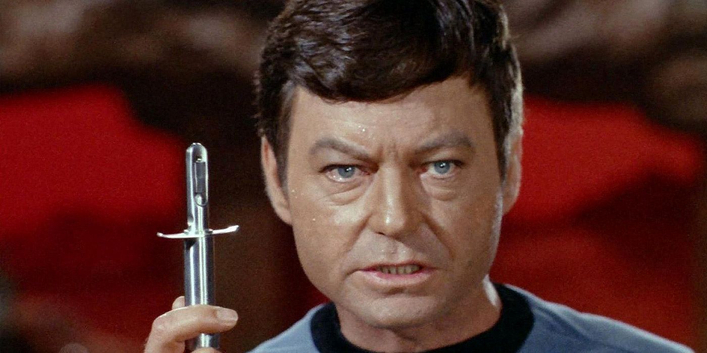 Dr. McCoy holding a hypospray in Star Trek