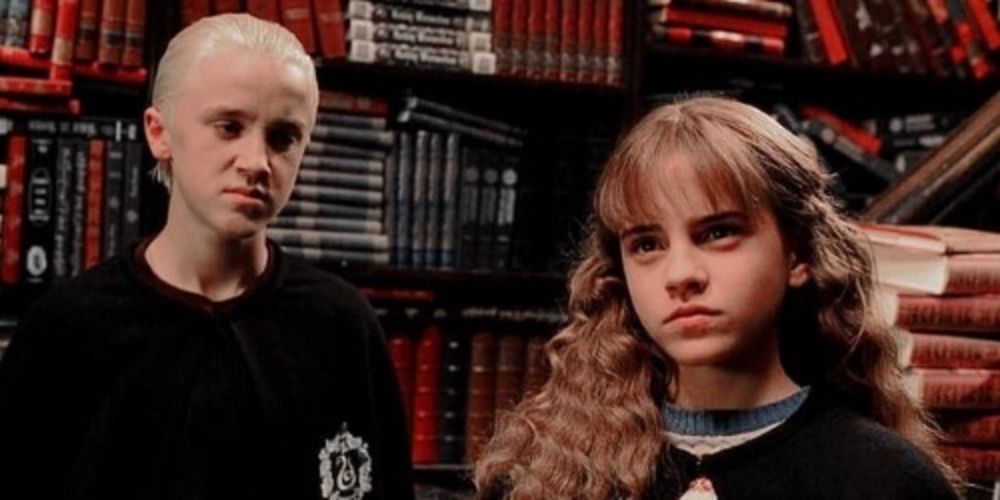 Draco Malfoy and Hermione in a book store in Harry Potter and the Chamber of Secrets 