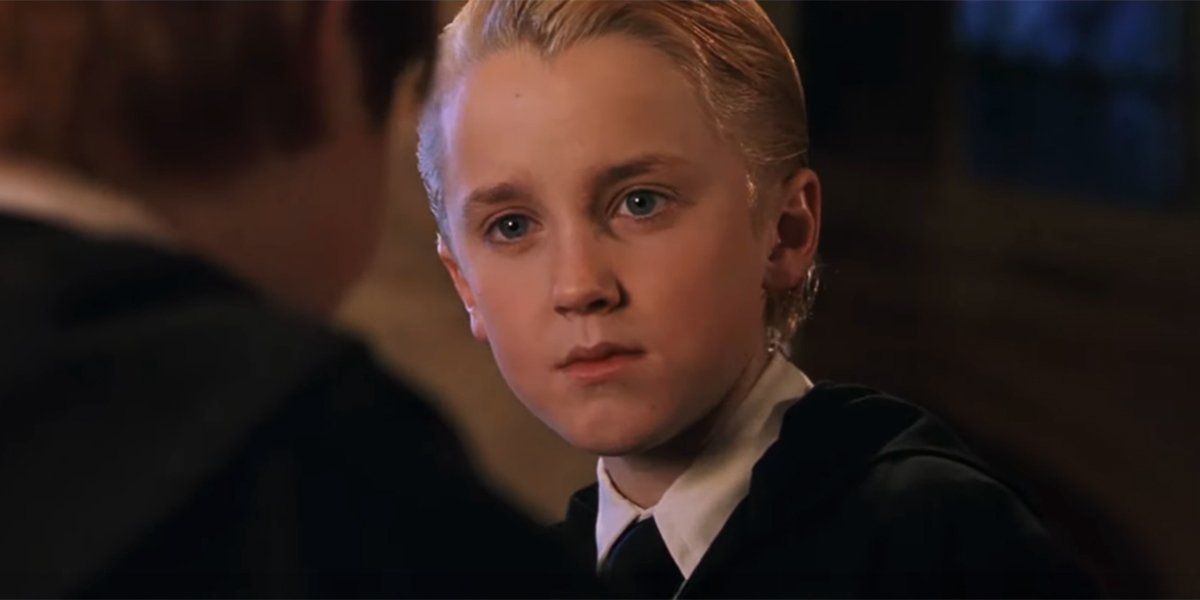 Draco Malfoy glares at Ron Weasley in Harry Potter and the Sorcerer's Stone