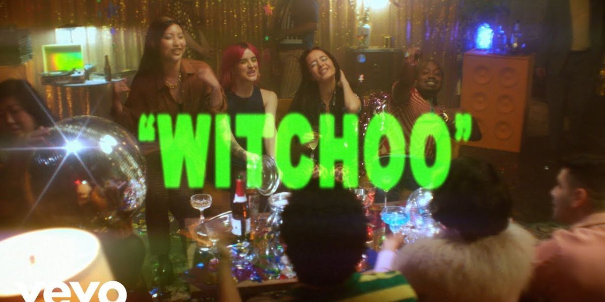 Friends at a party in the video for Witchoo