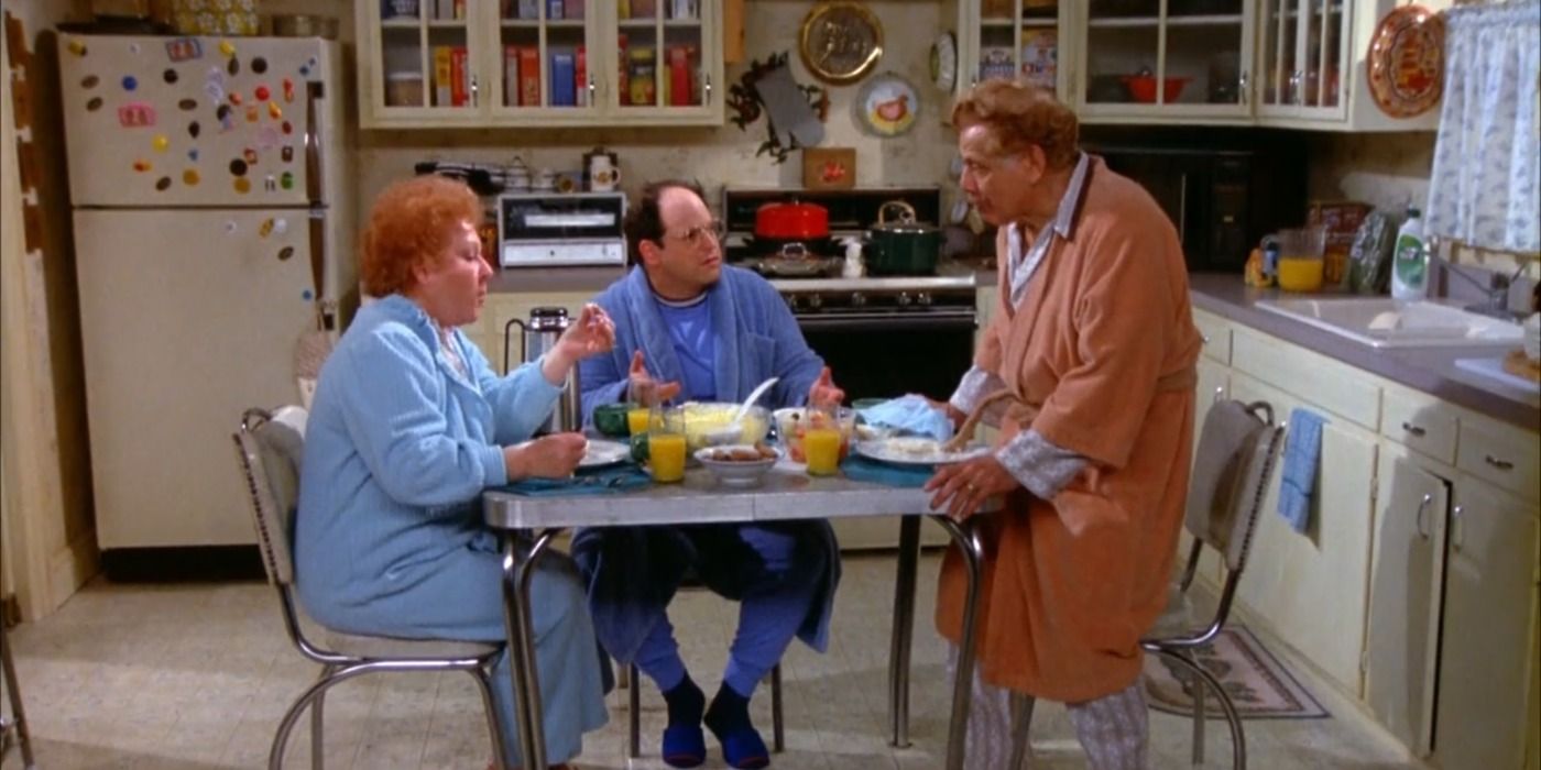 Estelle, George and Frank Costanza seated at the dinner table in Seinfeld