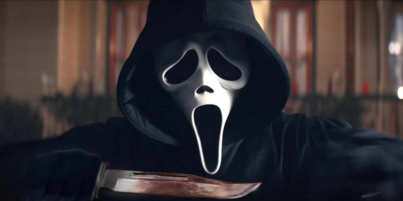 Ghostface with a bloody knife in Scream