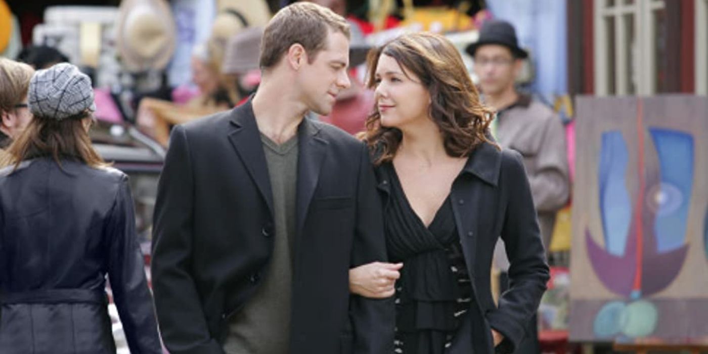 Christopher and Lorelai walking together in Paris on Gilmore Girls