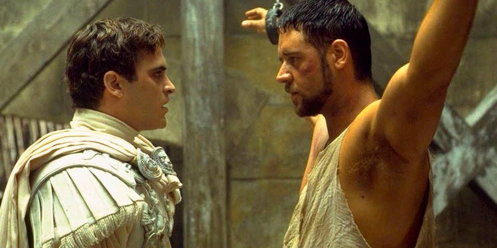 Commodus (Joaquin Phoenix) confronting Maximus (Russell Crowe) as he is chained up in Gladiator