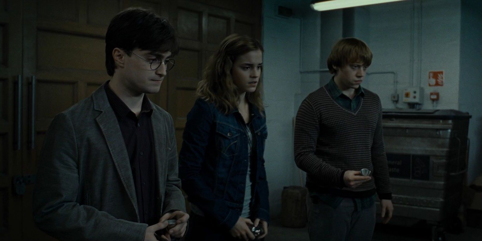 Harry, Ron, and Hermione in a cafe in Deathly Hallows 