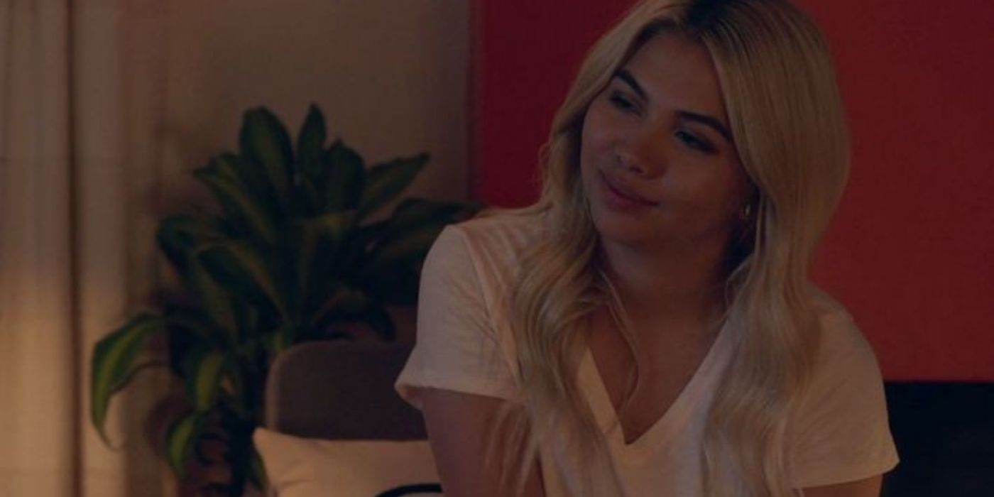 Hayley Kiyoko smiling and looking sideways in Insecure