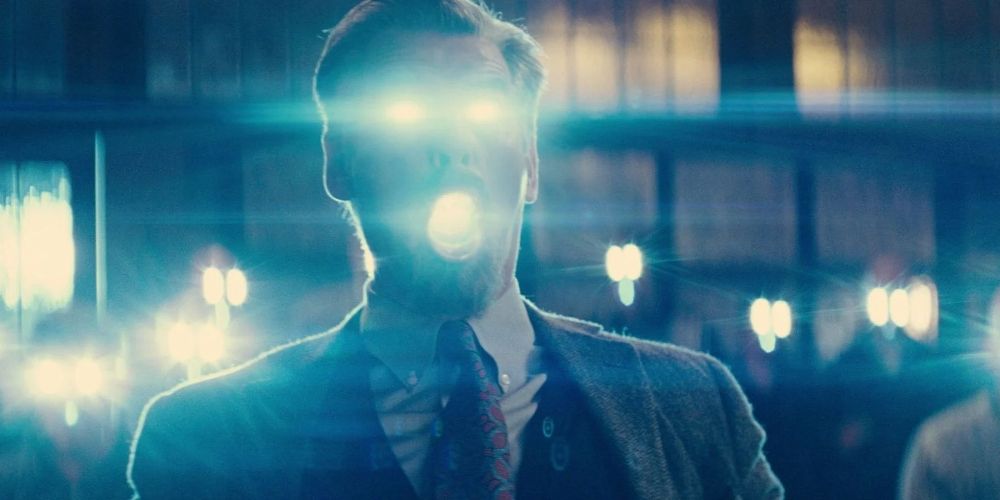 Guy lights up with blue lights in The World's End