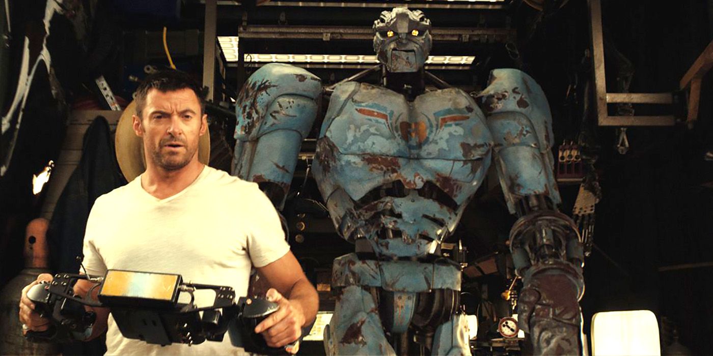 Charlie stands with his robot in Real Steel