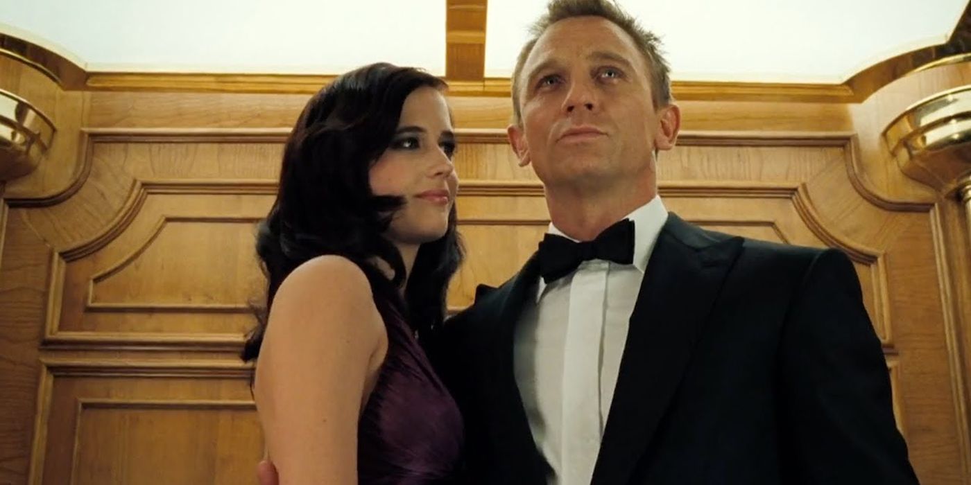 James Bond standing with Vesper in Casino Royale.