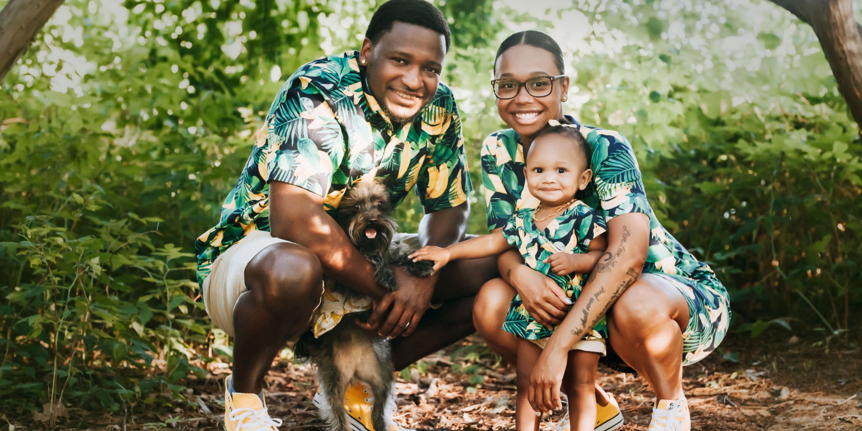 Married At First Sight's Jephte and Shawniece taking photos with their daughter and dog