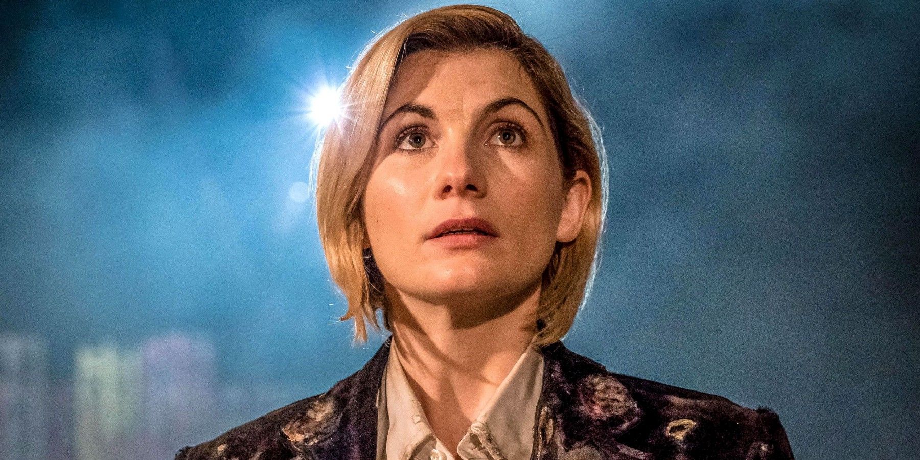 The Thirteenth Doctor looking up in Doctor Who