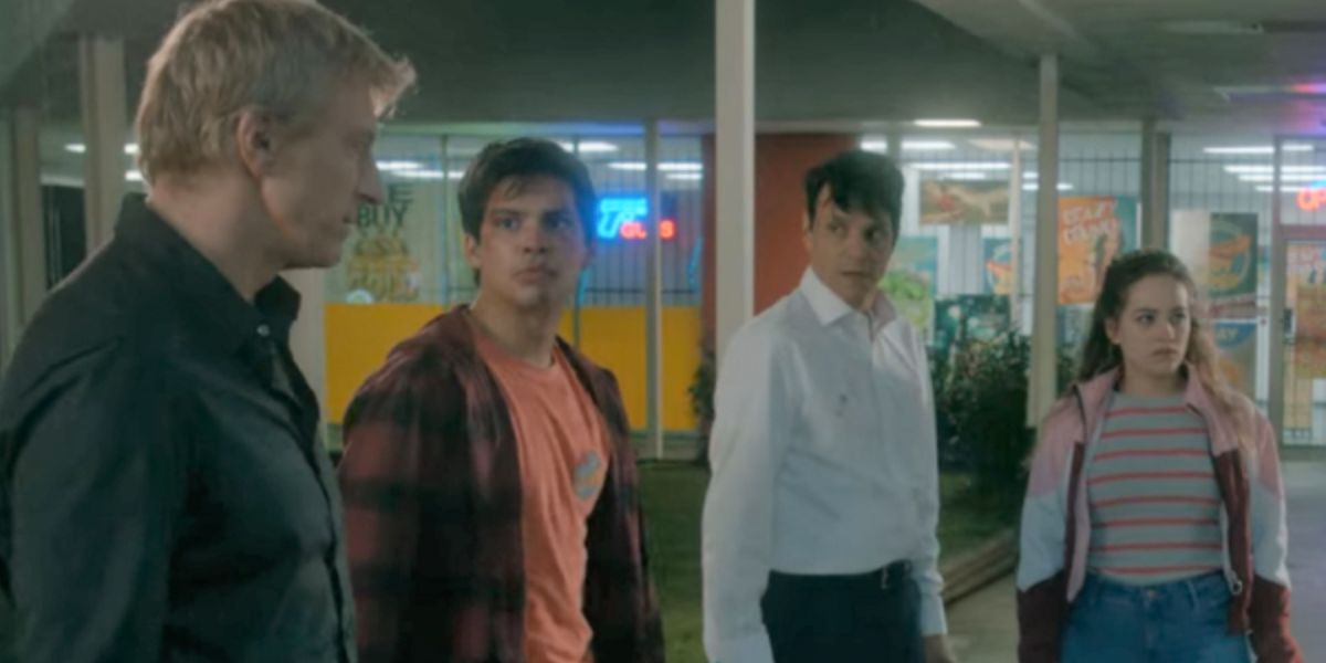 Johnny, Miguel, Daniel, and Sam outside of Cobra Kai dojo after Johnny and Daniel fight with Kreese