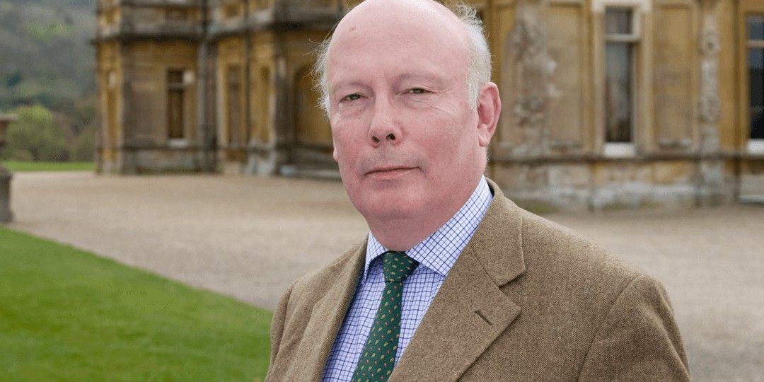 Julian Fellowes in front of the Downton Abbey property