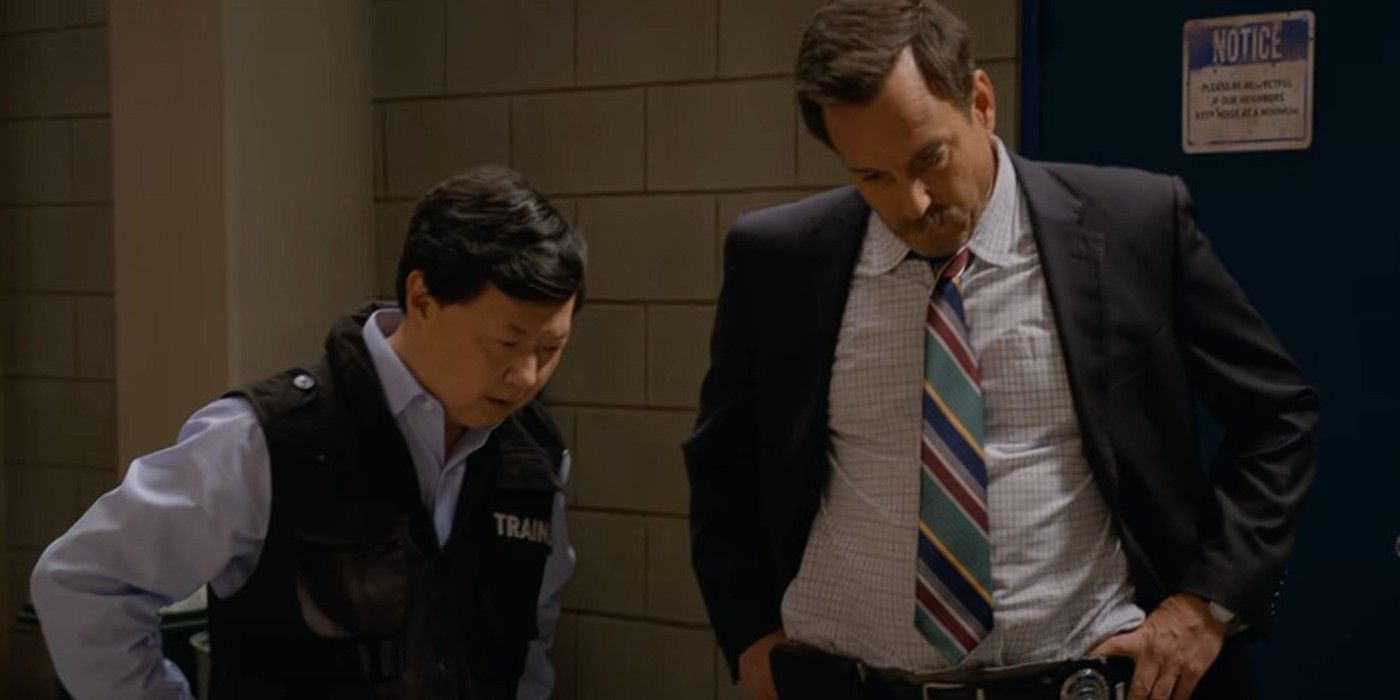 Ken Jeong looks down in concern in Murderville.