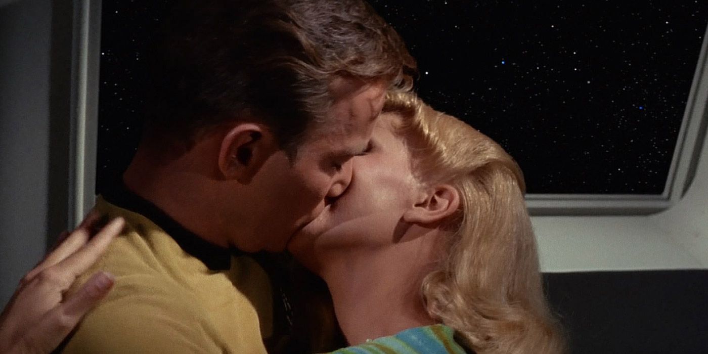Captain Kirk kissing a woman in Star Trek