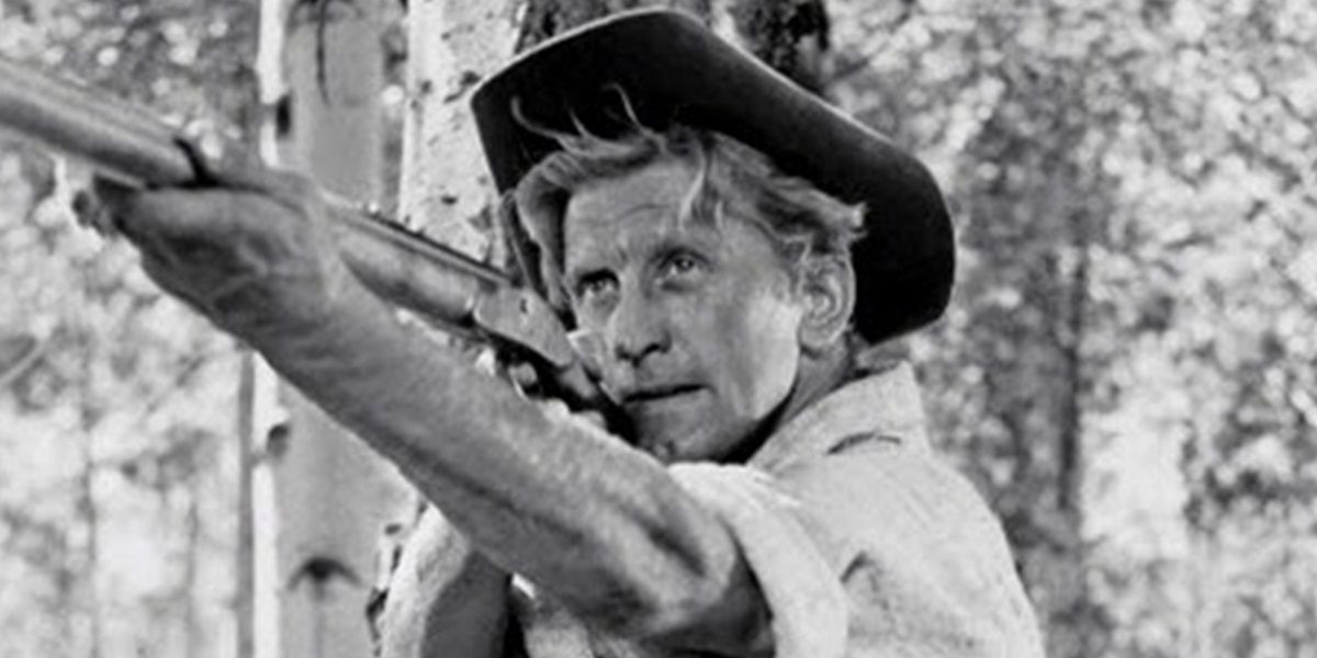 Kirk Douglas with a rifle in The Big Sky