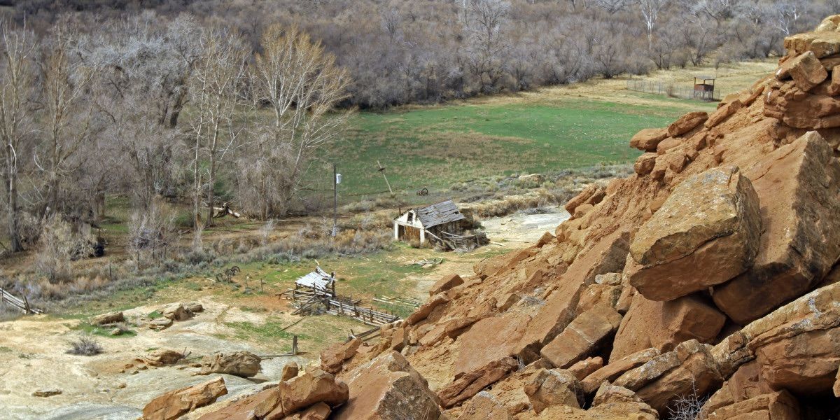 The house on the Skinwalker Ranch seen from on top of a hill 