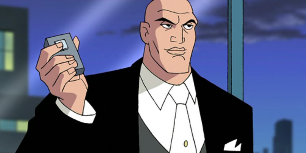 Lex Luthor holds up a remote in DCAU 