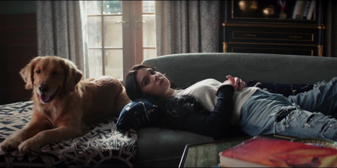Lucky and Kate Bishop laying down on the couch in Hawkeye