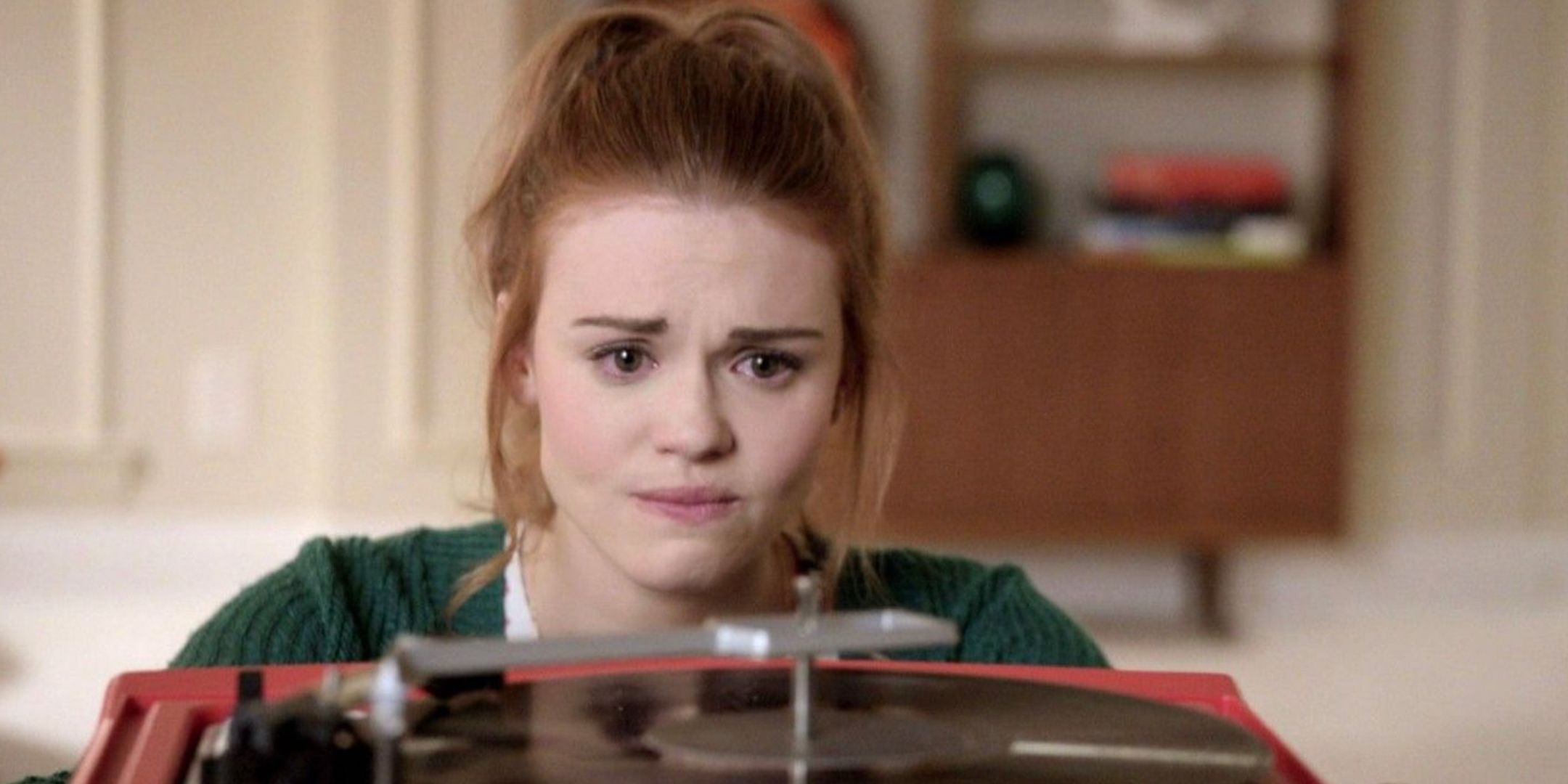 Lydia stares at a record player in Teen Wolf