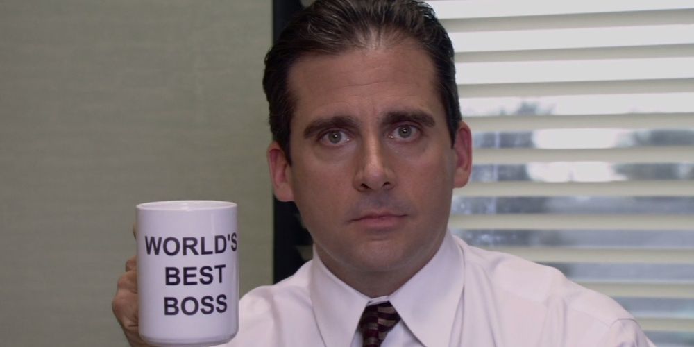 Michael Scott holds up coffee mug in The Office