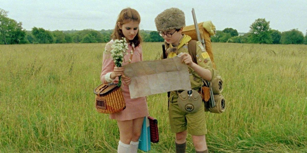 Sam and Suzy looking at a map in Moonrise Kingdom