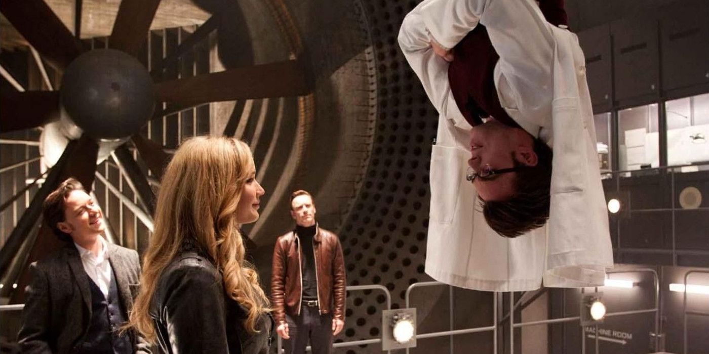 Beast hangs upside down as Mystqiue looks on in X-Men First Class.