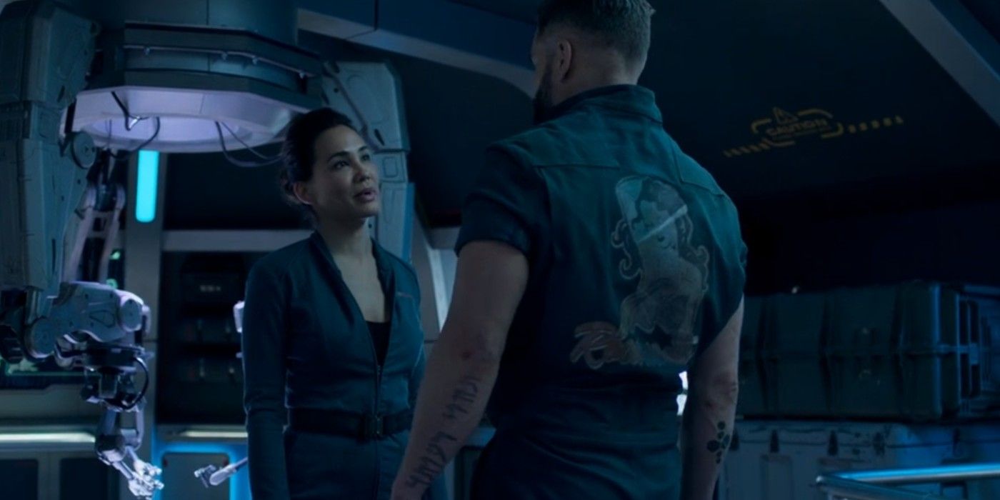 Nadine Nicole as Clarissa Peaches and Wes Chatham as Amos in Expanse