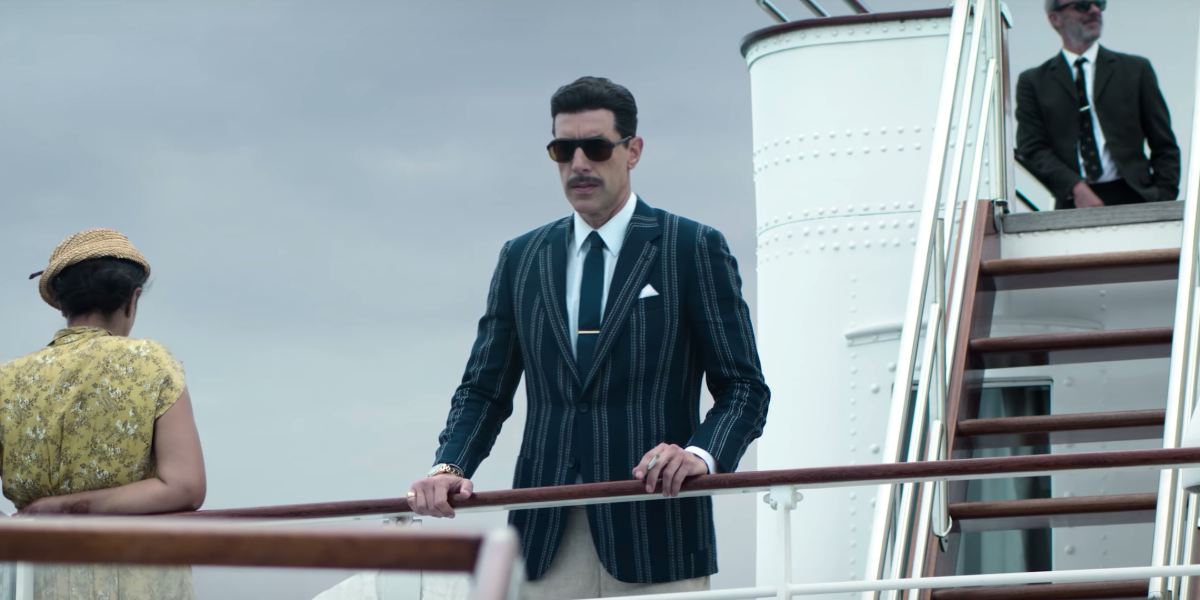 Sacha Baron Cohen as Eli Cohen on a boat in Netflix's The Spy