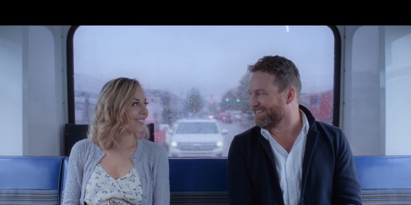 Patrick Gilmore as David and MacKenzie Porter as Marcy in Travelers