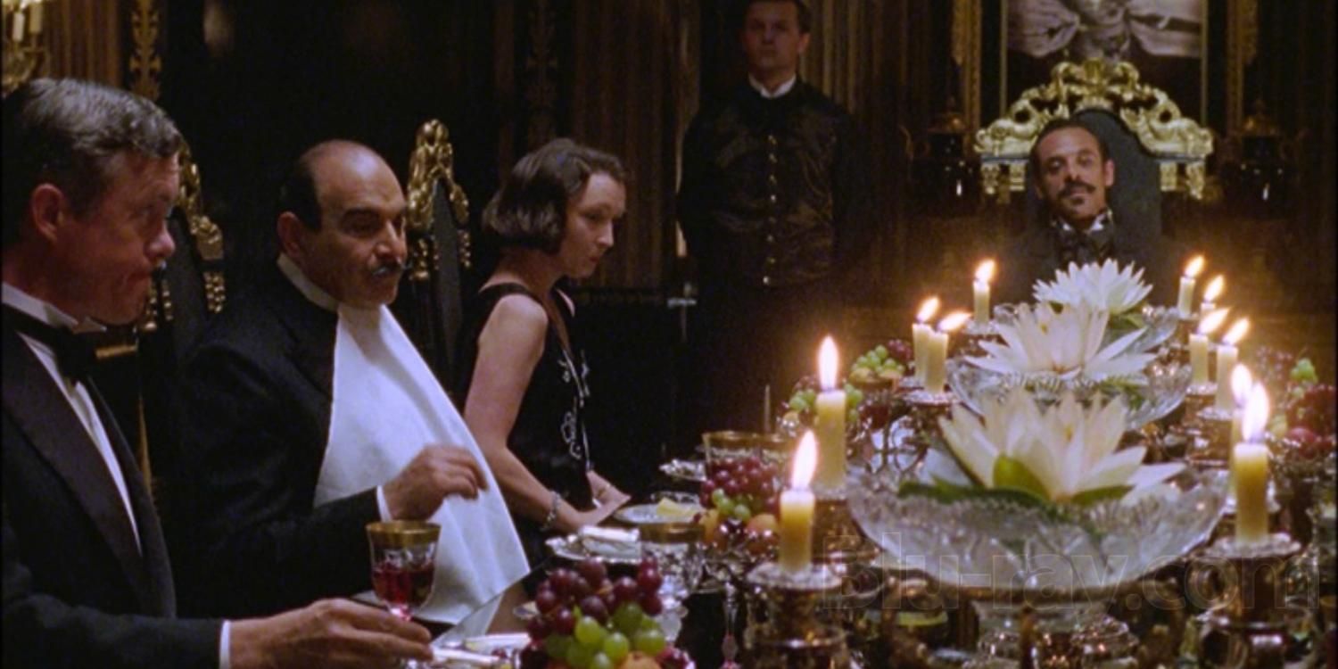 Poirot at a lavish dinner in cards on the table