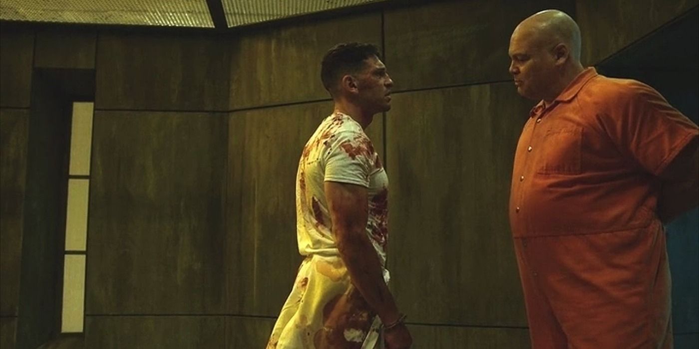 Punisher in chains talking to Kingpin in prison