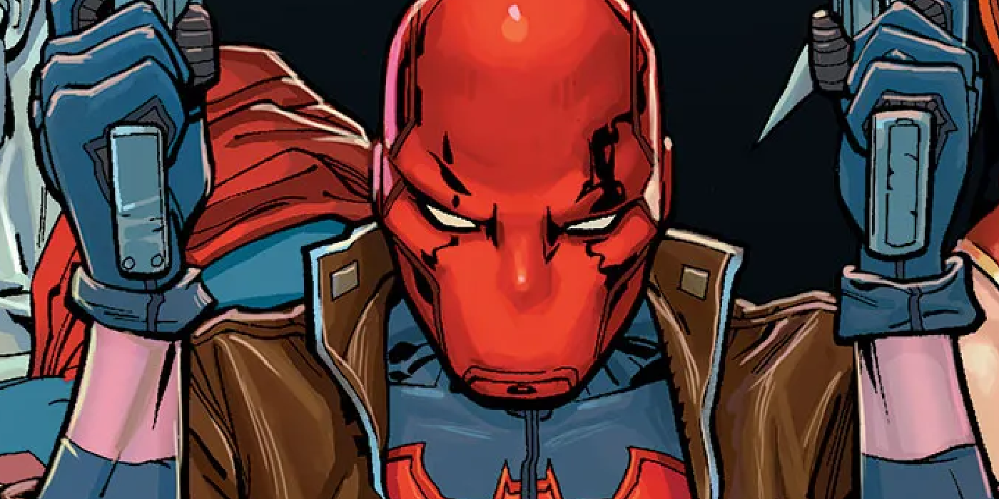 Red Hood holding two guns in the comics