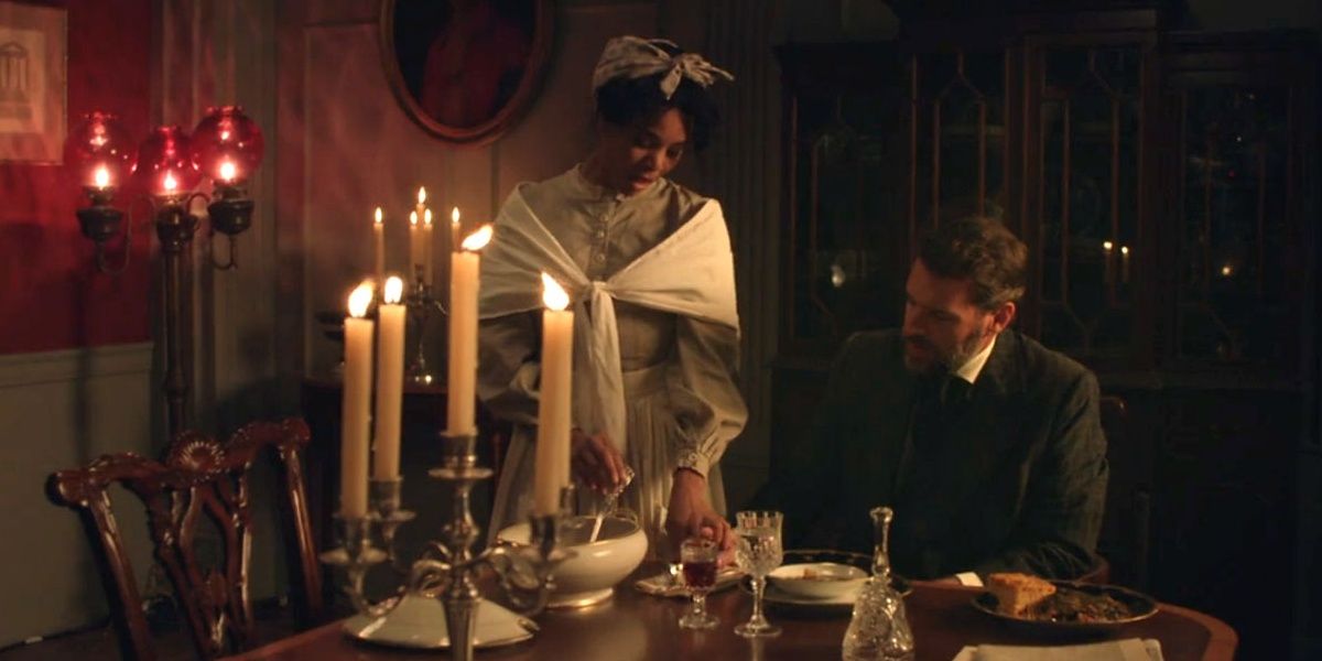 Regina Hall stands while Scott Foley sits on the table in a still from Due North (Insecure)