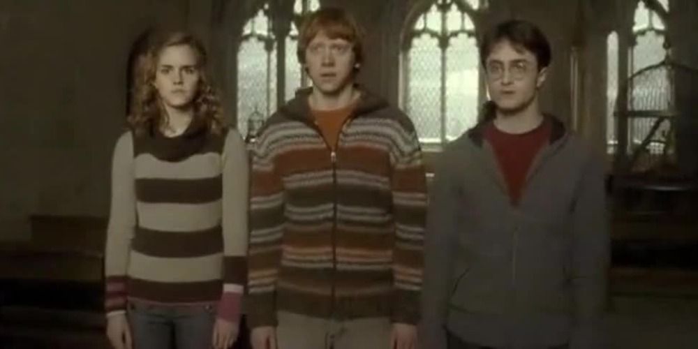 Ron, Hermione and Harry getting in trouble from Professor McGonagall