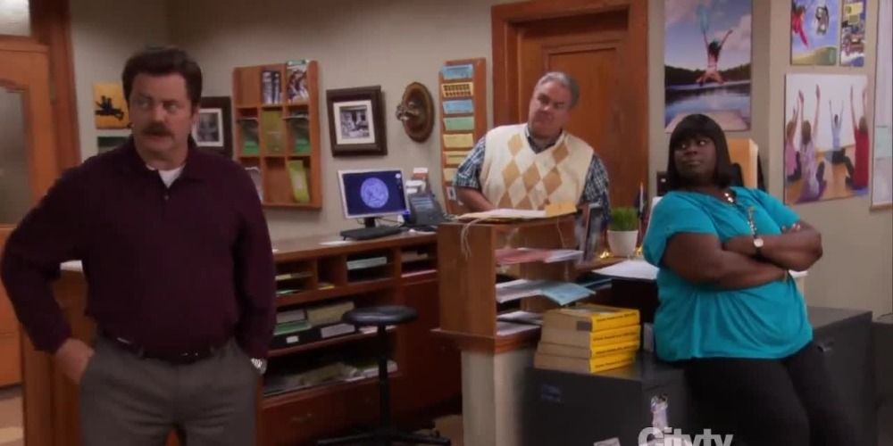 Ron on Parks and Rec standing in the office