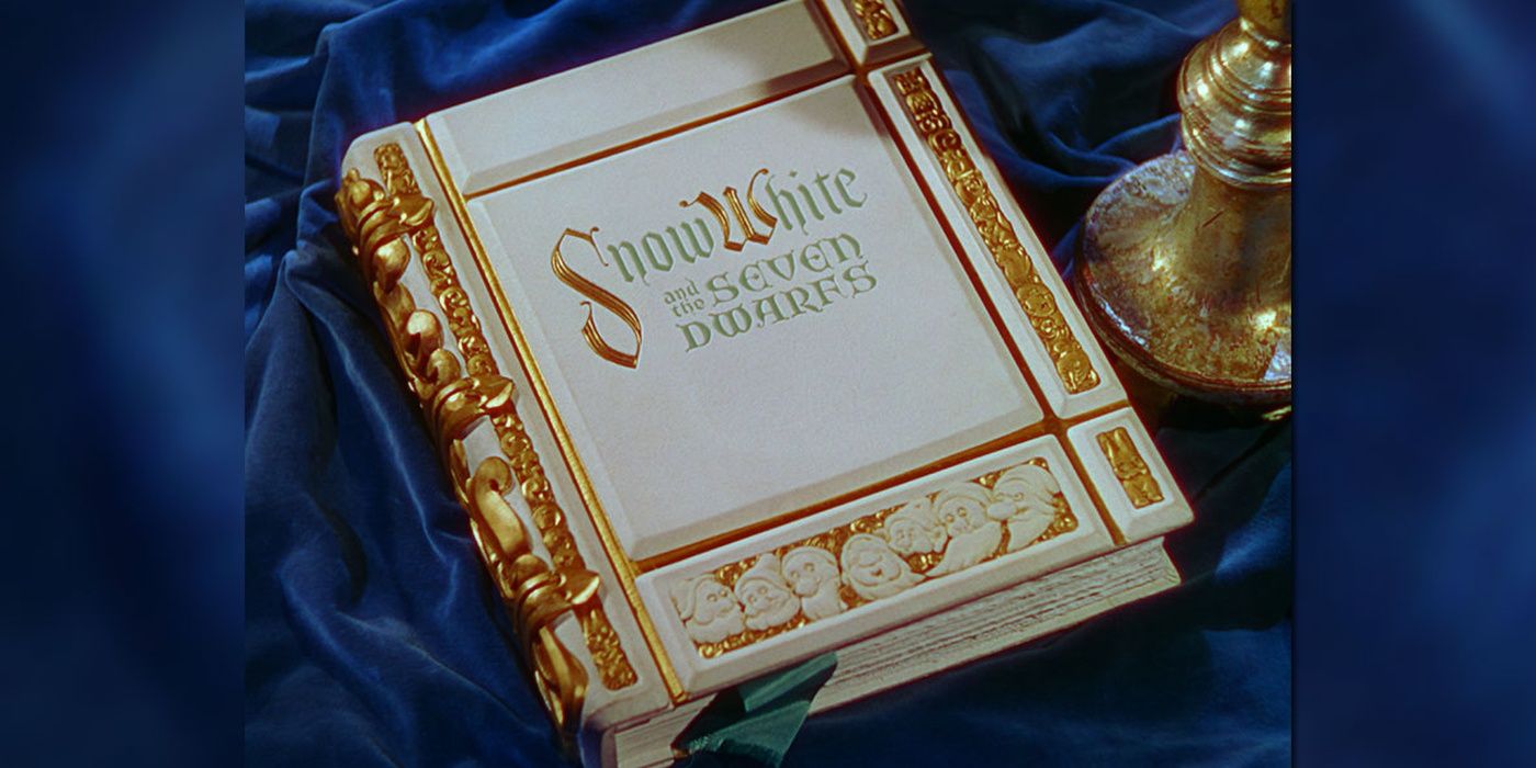 The book laying on velvet at the beginning of Snow White