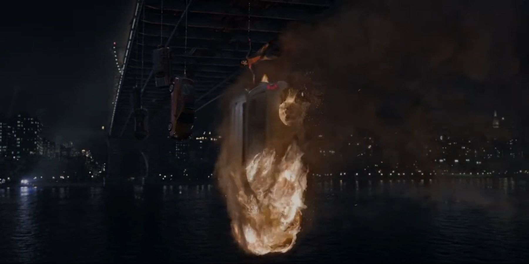 Spider-Man holding a flaming SUV up with one hand in The Amazing Spider-Man