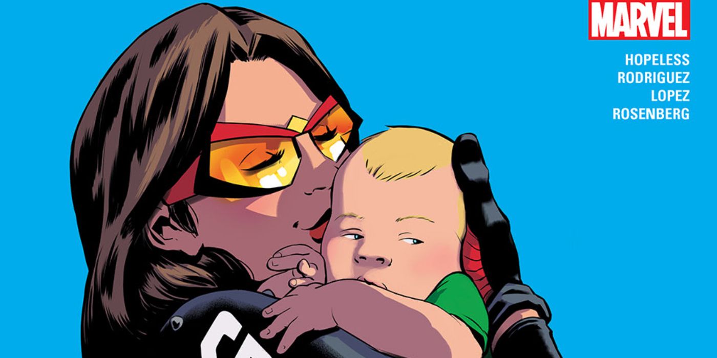 Spider-Woman holding her son in Marvel comics
