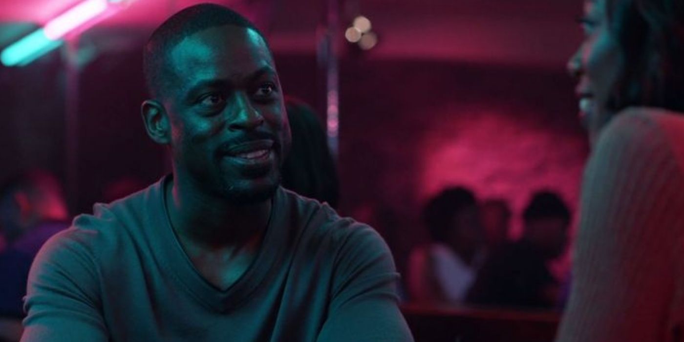 Sterling K Brown smiling and looking at Yvonne Orji in Insecure