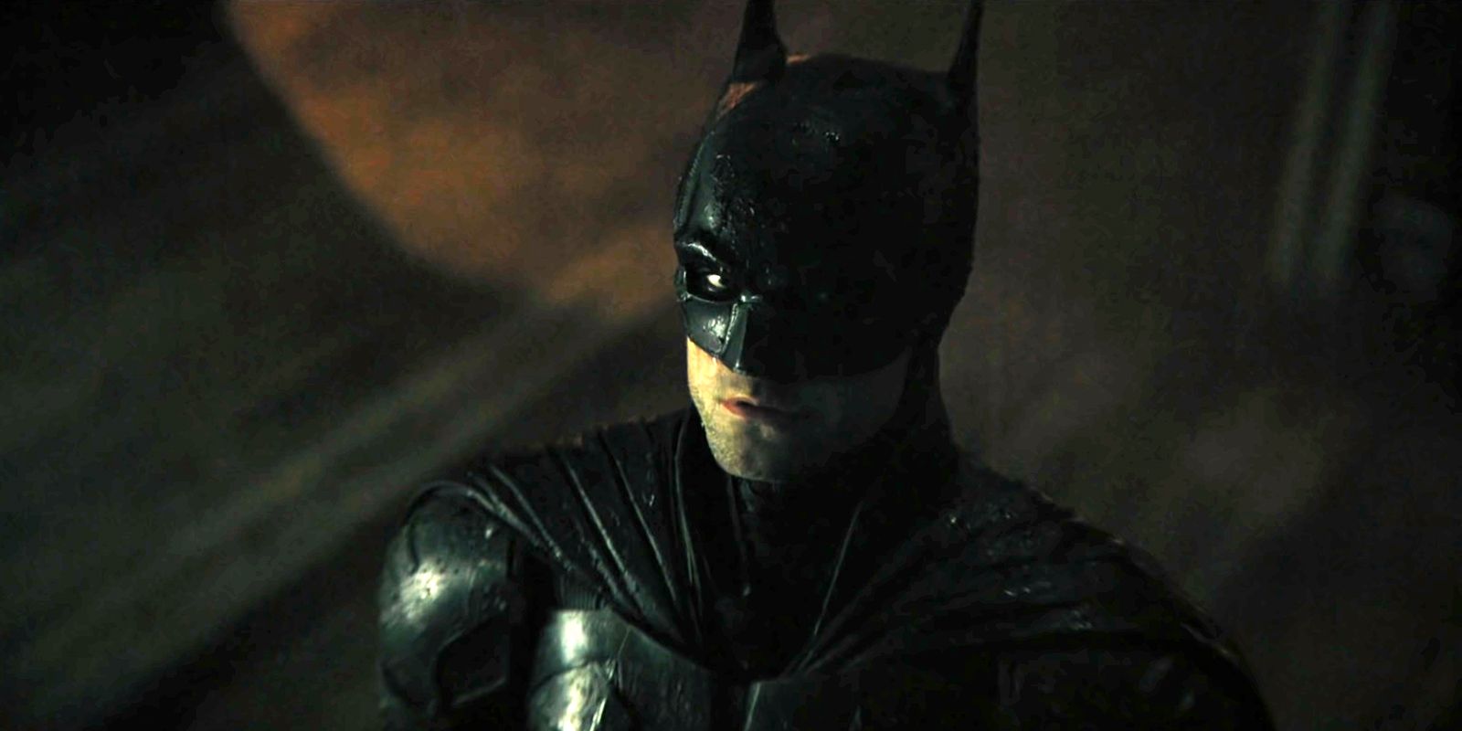 Robert Pattinson as Batman in The Batman looking up