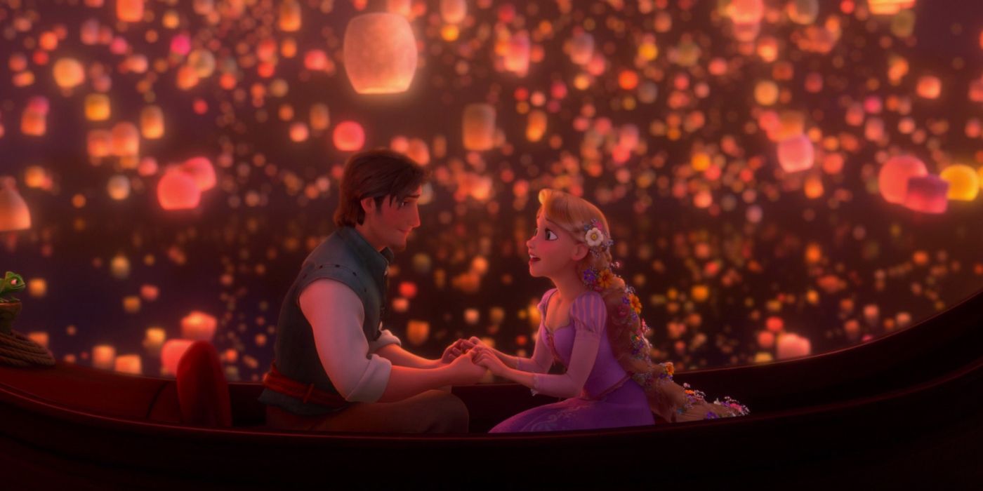 Flynn and Rapunzel in a boat surrounded by lanterns in Tangled