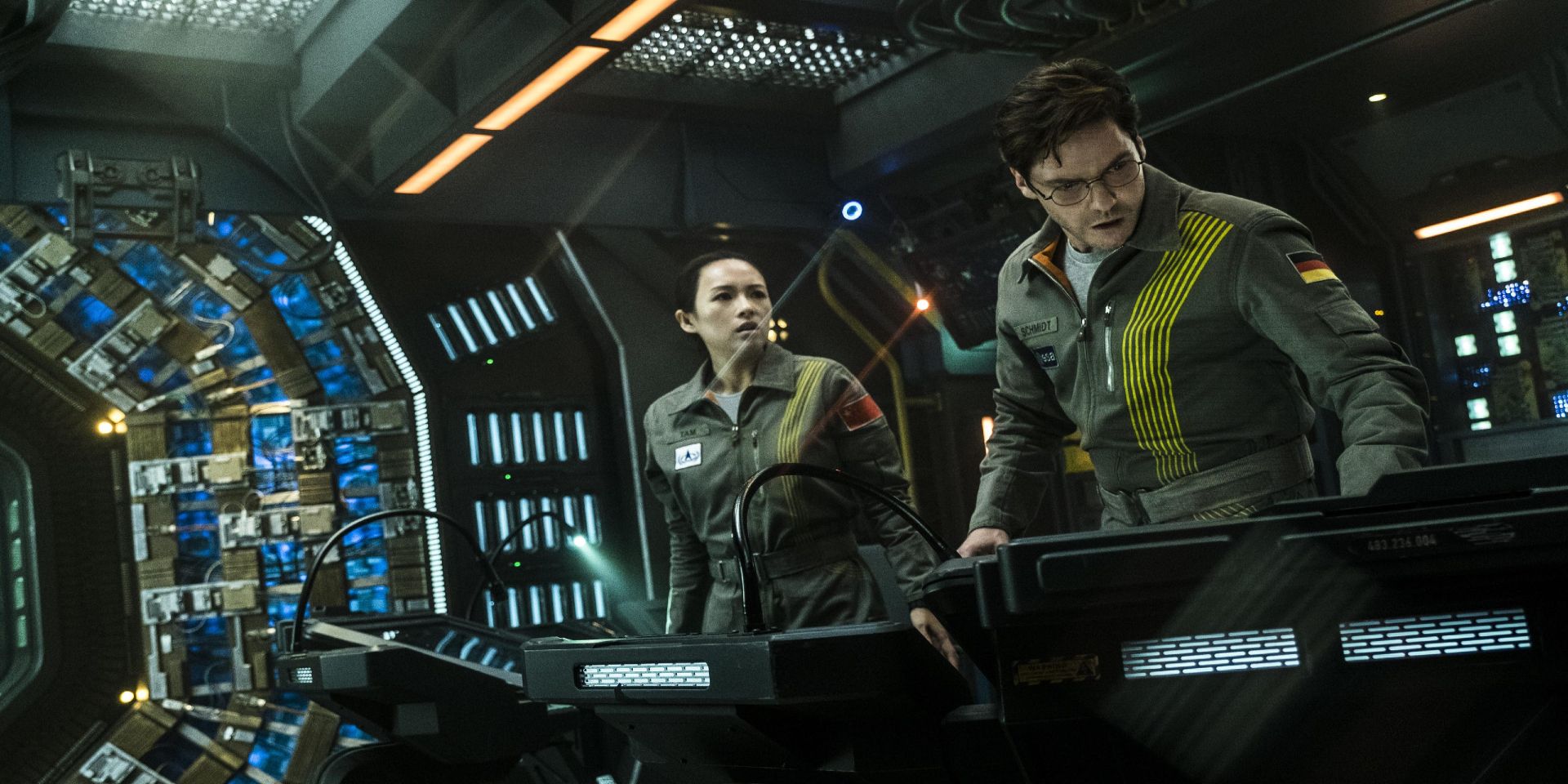 Ernst and Ava on a ship in The Cloverfield Paradox.