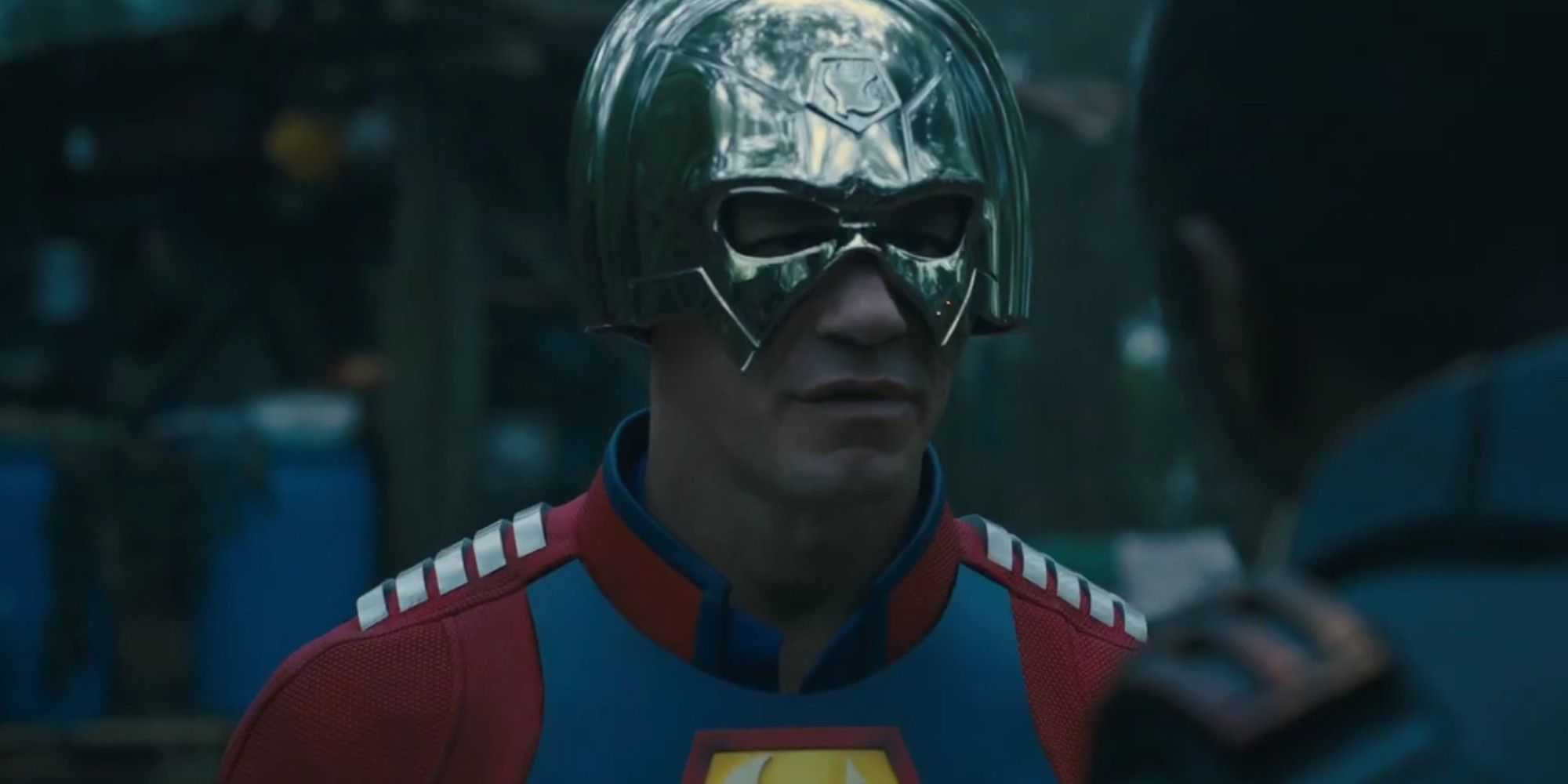 John Cena as Peacemaker in the woods in The Suicide Squad