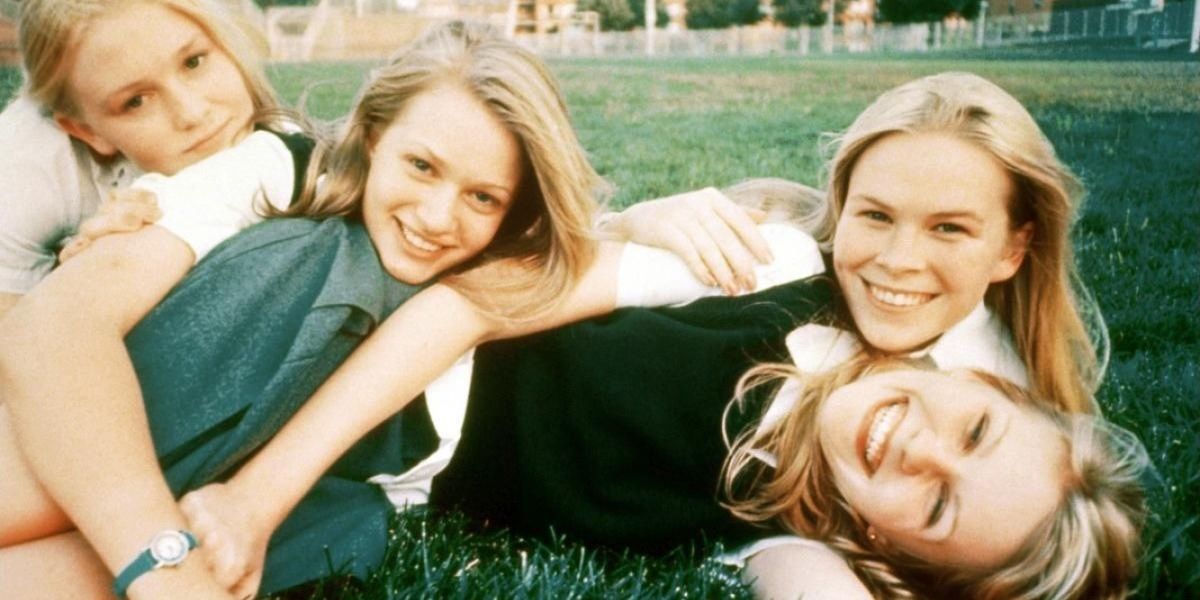 Four girls playing in a field in The Virgin Suicides