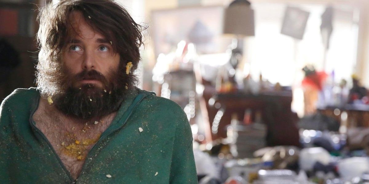 The last man on earth character sitting in his own filth