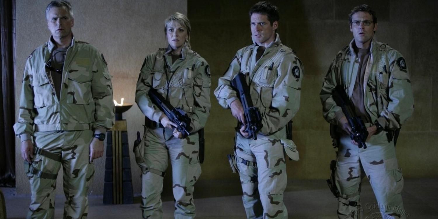 The main cast of Stargate Continuum in uniform with guns